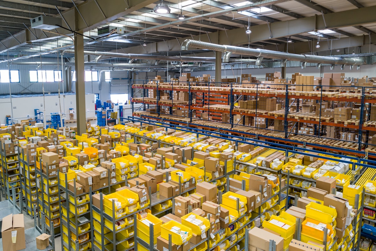 Parcels in a fulfillment warehouse awaiting COD confirmation calls in Pakistan